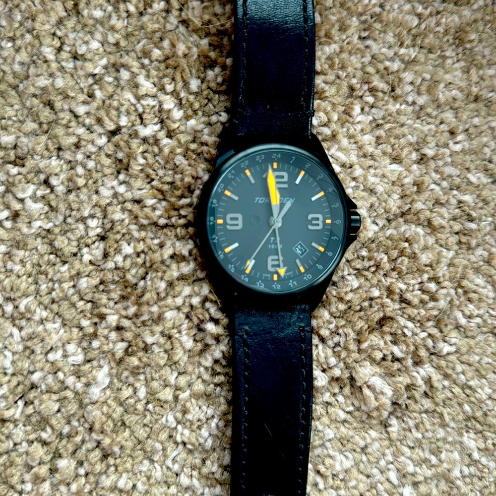 Torgoen T9 with black leather band. Worn only once